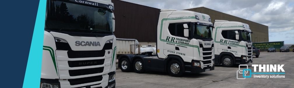 RR Transport White delivery trucks lined up