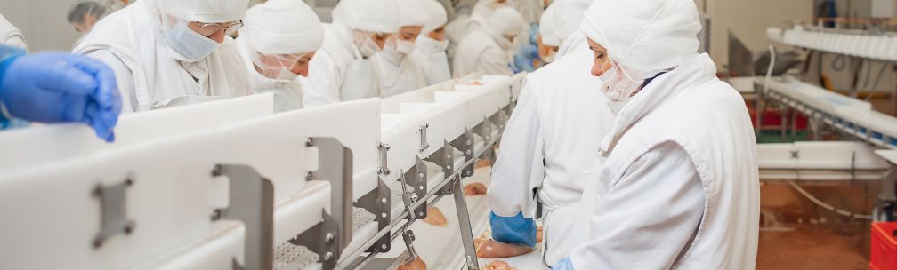 Food Distribution and Cold Storage Challenge A person in yellow overalls and a face mask moves a blue container with a toxic skull and crossbone warning on the side