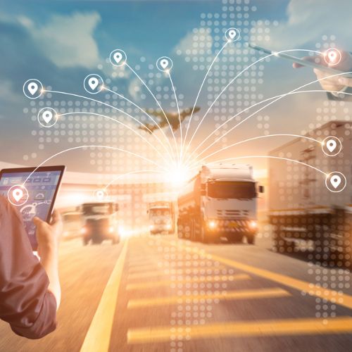 A graphic image depicting deliveries using a tablet with WMS software, location pins and lorries on a motorway
